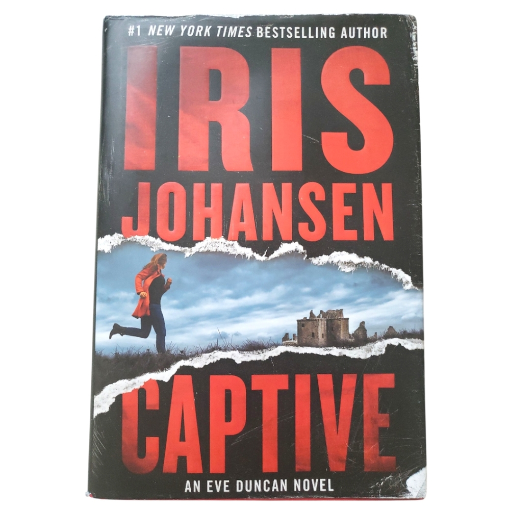Captive Hardcover Book